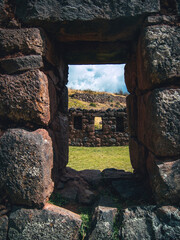 Machupicchu Cusco Peru Historical, touristic place of the ancient civilization of the Inca Empire. Runes of the ancient city on the mountain of Machupichu and Huayna Picchu. House with window
