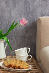 Lemon cake table bed jug bouquet tulips bedroom