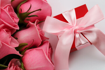 greeting card design. rose bouquet and gift box. space for text. invitation. congratulation 