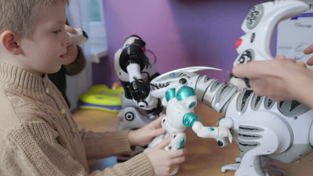 children playing with robots close up