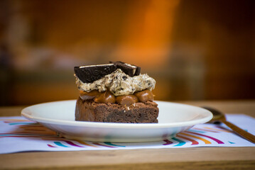 chocolate dessert, spoon on wooden table