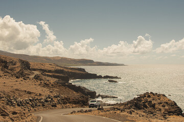 Long desert road with the end on the beach in Kaupo, Maui, Hawai.
