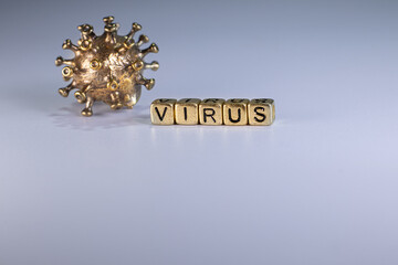 Strong angry virus with a face. The coronavirus is slightly blurred. A type of virus made of metal