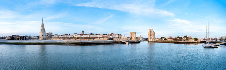 Panoramic view of thecold harbor of La Rochelle with the three famous towers : la Lanterne, Saint...