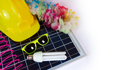 Photovoltaic solar panel with Brazilian carnival elements. Solar plate with glasses, lucky...