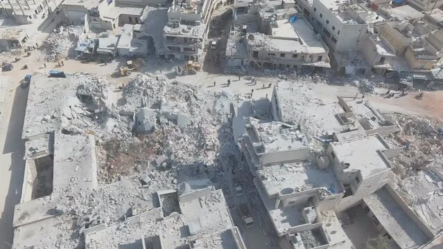 An aerial view of a bombed-out house in the Syrian city of Deir ez-Zor, a rescue operation is underway to clear the rubble.