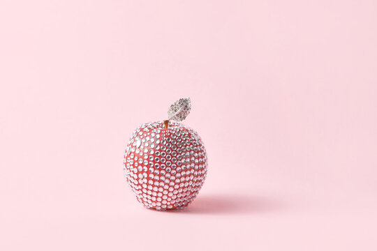 Shiny apple with gemstones