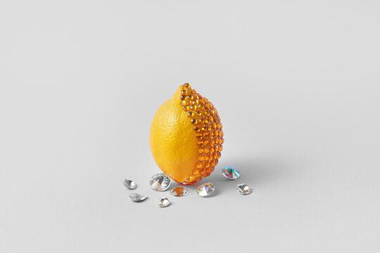 Lemon with shiny gemstones