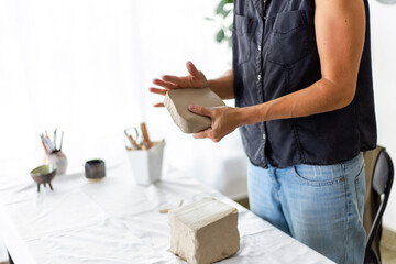 Woman Shaping Clay