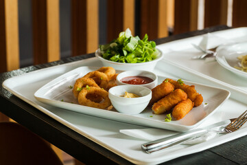 Fried Potato And Onion Rings.