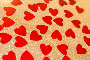 Heart symbol on a gold shiny background