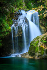 Fototapeta na wymiar Radnova River and majestic Waterfall Sum, Vintgar Gorge, slovenia