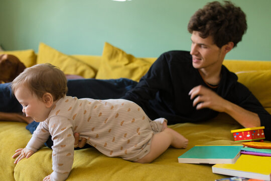 father with child on the sofa
