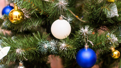 Christmas.New Year's toys on the Christmas tree close-up.