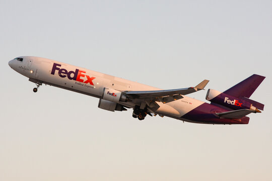 FedEx cargo jet aircraft departing Los Angeles early in the morning