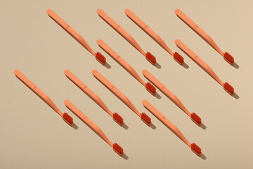 Set of tooth brushes on light background