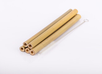 Bamboo straws on a white background. Ecological bamboo straws. Thanks to these bamboo straws, we can be a more environmentally conscious society. Say no to plastic.