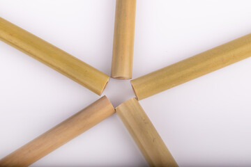 Bamboo straws on a white background. Ecological bamboo straws. Thanks to these bamboo straws, we can be a more environmentally conscious society. Say no to plastic.