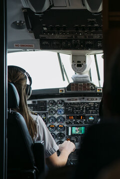 Woman Pilot flying airplane