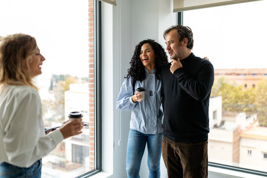Happy couple visiting apartment to rent