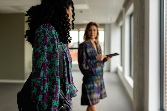 Female partners renting new workspace
