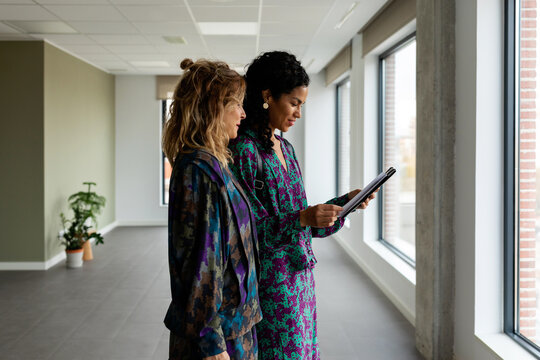 Female partners renting new office