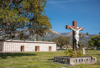 Jesus on the Cross statue at Calvary Cemetery. Santa Barbara, CA, USA