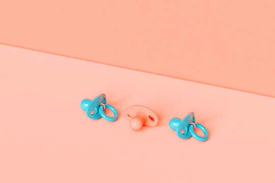 pacifier in pastel colors with copy space