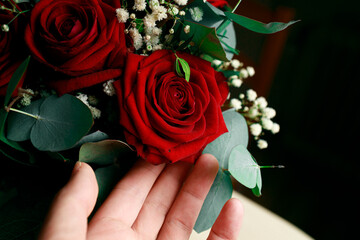 bouquet of red roses on a table