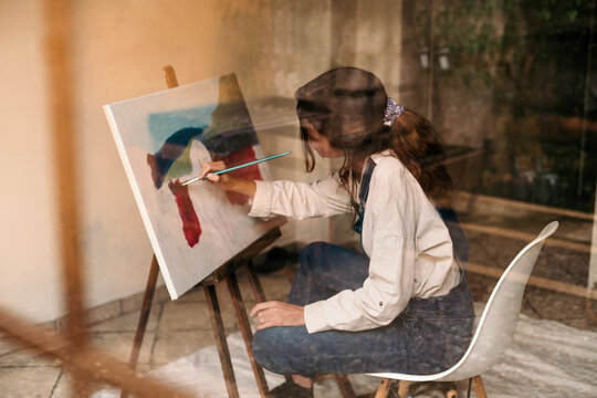 Painter creating in the art studio