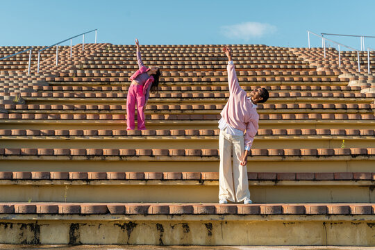 Dancer friends performing on outdoor tier
