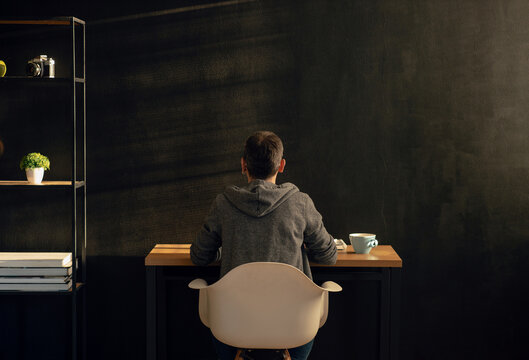 Man Using A Laptop Home