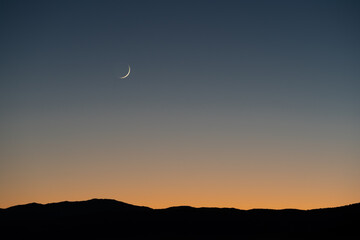 Crescent Moon over Mountains at Dusk (Wide Version)