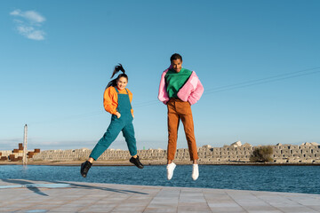 Cool friends listening to music and dancing