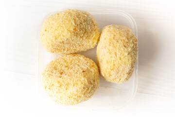 zrazy or cutlets from potatoes in a container on the table