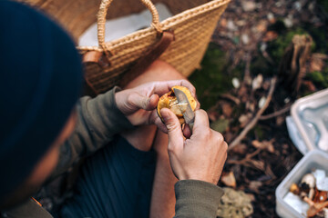 Man cutting a mushroom