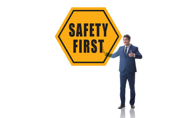 Safety first concept with businessman