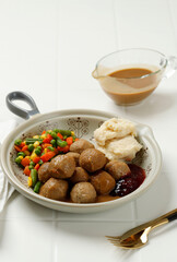 Swedish Meatball with Lingonberry Jam and Brown Mushroom Sauce.
