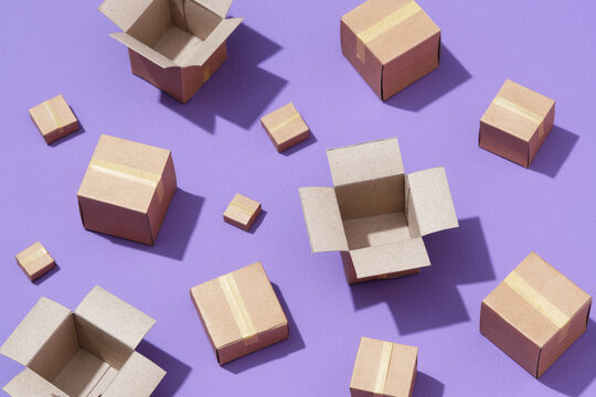 Lot of cardboard boxes on purple background