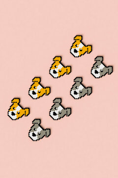 Pixelated brown and grey dogs on pink background