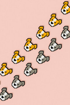 Pixelated dogs on pink background crossing the frame.