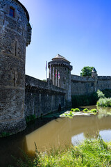 View of the observation towers of the medieval fortified Castle of Fougeres.Blue sky on a clear sunny summer day. City of Fougeres, department of Brittany,France.
