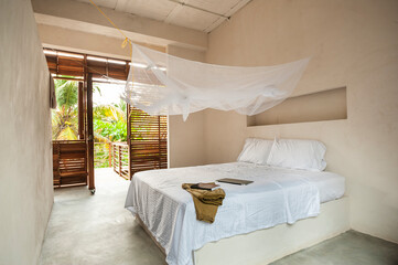 Luxury bedroom in house at tropical beach