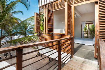 Luxury bedroom in house at tropical beach