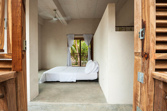 Luxury bedroom in house at tropical beach