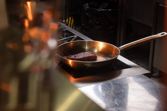 Frying Beef Steak On Pan

