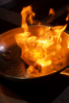 Frying Beef Steak On Pan, flambe
