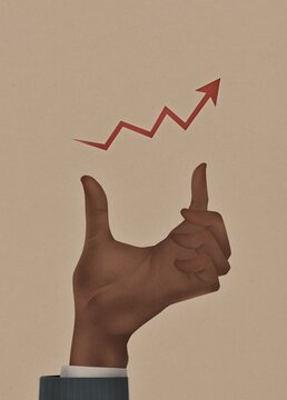A businessman's hand holds a red arrow up illustration