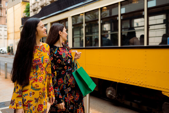 Woman looks at the tram