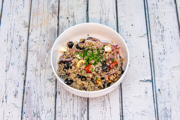 Quinoa is an herb belonging to the Chenopodioideae subfamily of Amaranthaceae. Technically it is a seed, but it is known and classified as a whole grain.